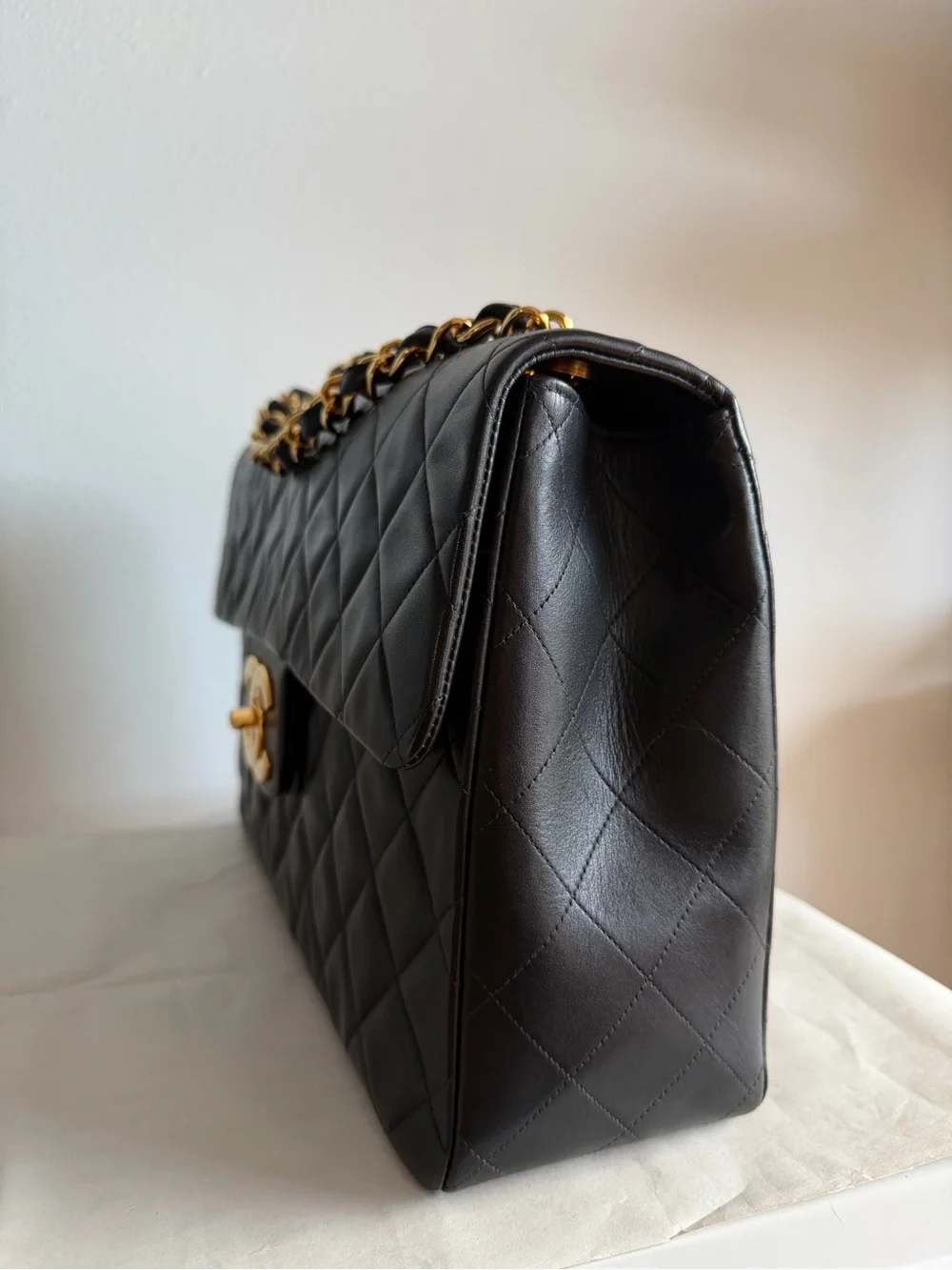 CHANEL Black Quilted Shoulder Bag with Gold Chain & CC Lock